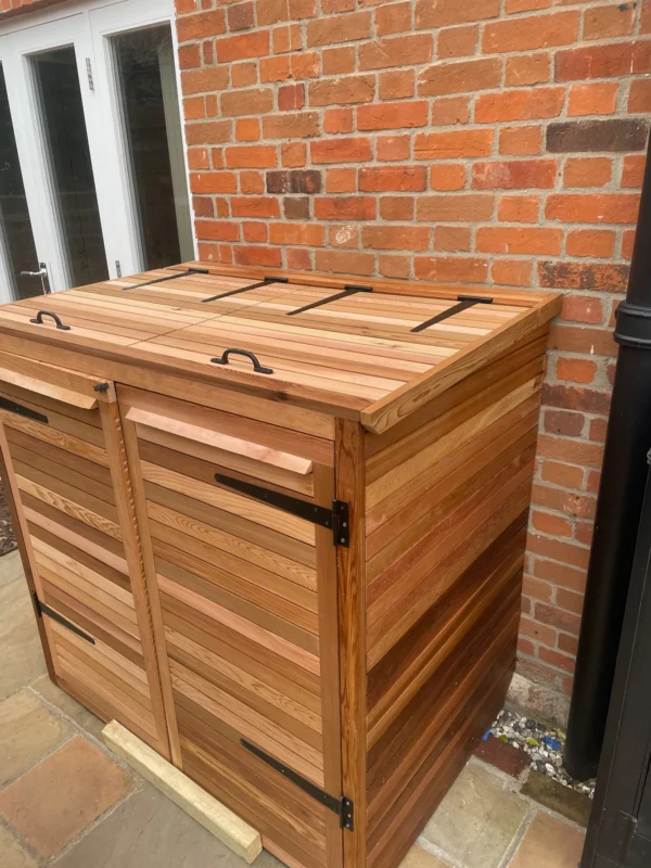 A wooden outdoor storage box.
