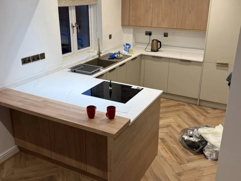 A modern kitchen with a neutral colour palette.